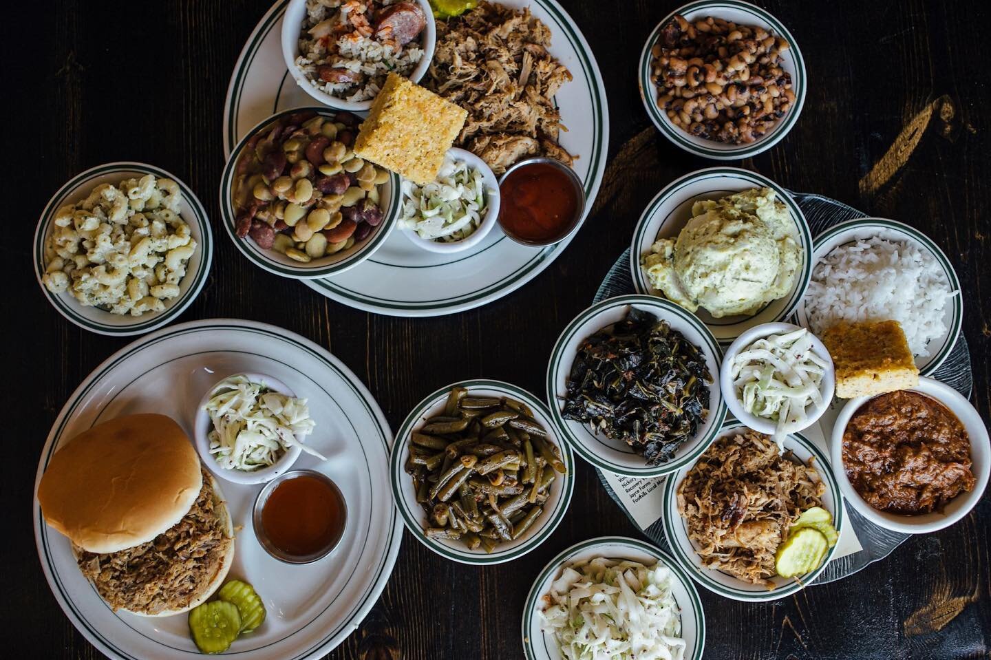 There is nothing more glorious than a table full of bbq and sides. ✨ 

What sides are you choosing? 
👉 Baked Beans
👉 Coleslaw
👉 Collard Greens
👉 Curly Fries
👉 Green Beans
👉 Hash &amp; Rice
👉 Hashbrown &amp; Cheese Casserole
👉 Hushpuppies
👉 Mashed Potatoes &amp; Gravy
👉 Potato Salad
👉 Zapps Chips @realzappschips

Here till 9pm. Link in bio for menu/ordering. #southernsides